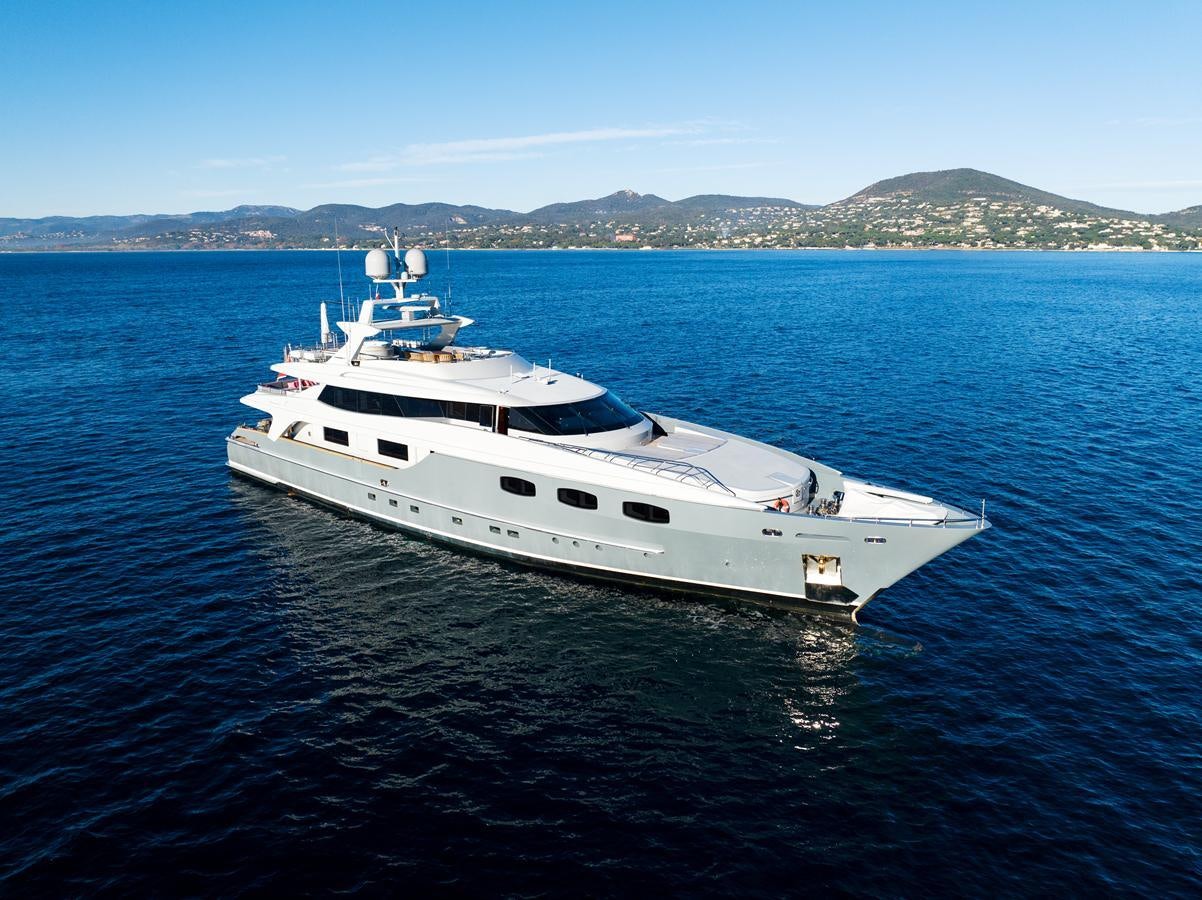 a white yacht in the water aboard ANNAMIA Yacht for Sale