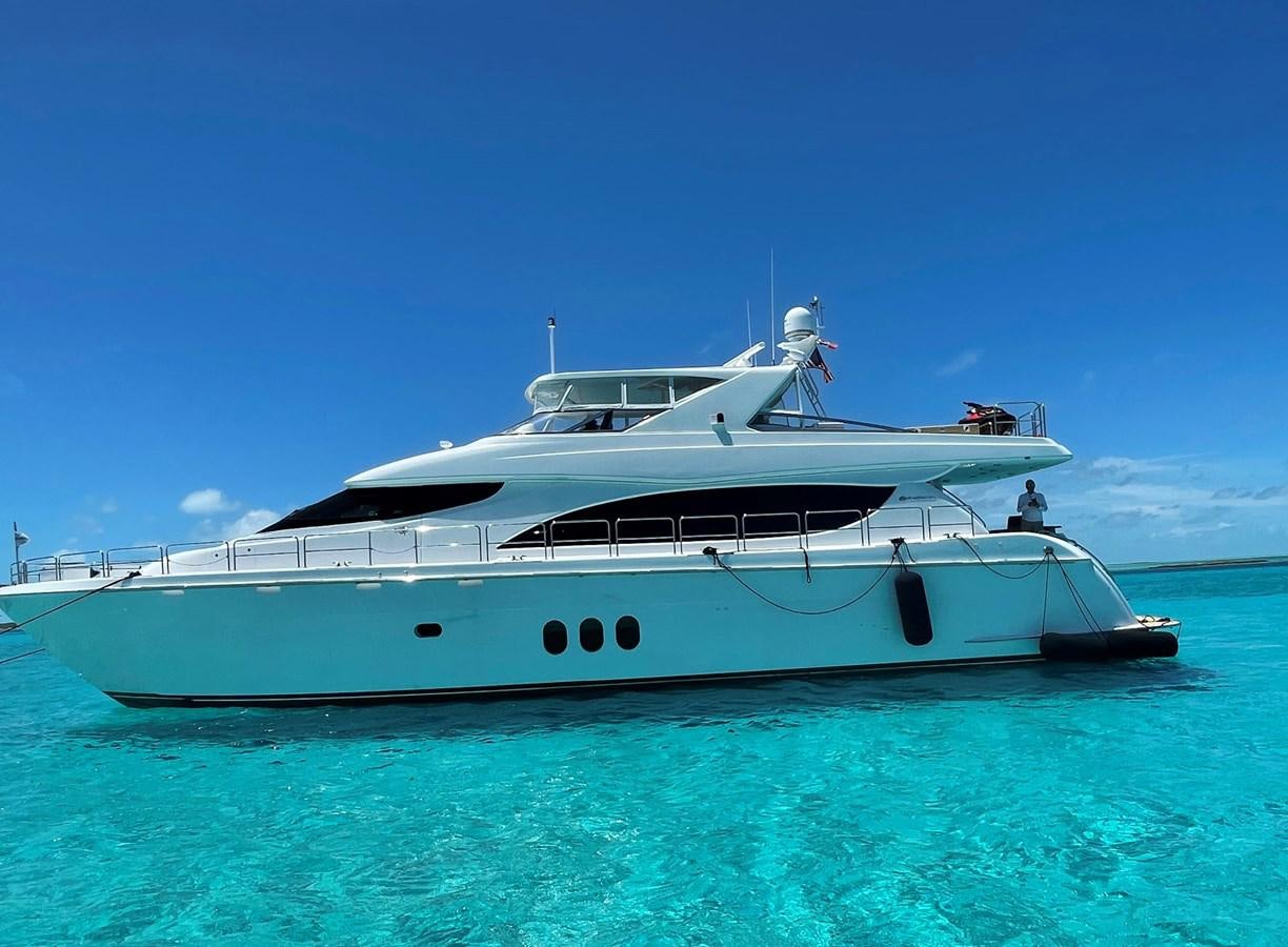 a white yacht in the water aboard ARETECTE Yacht for Sale
