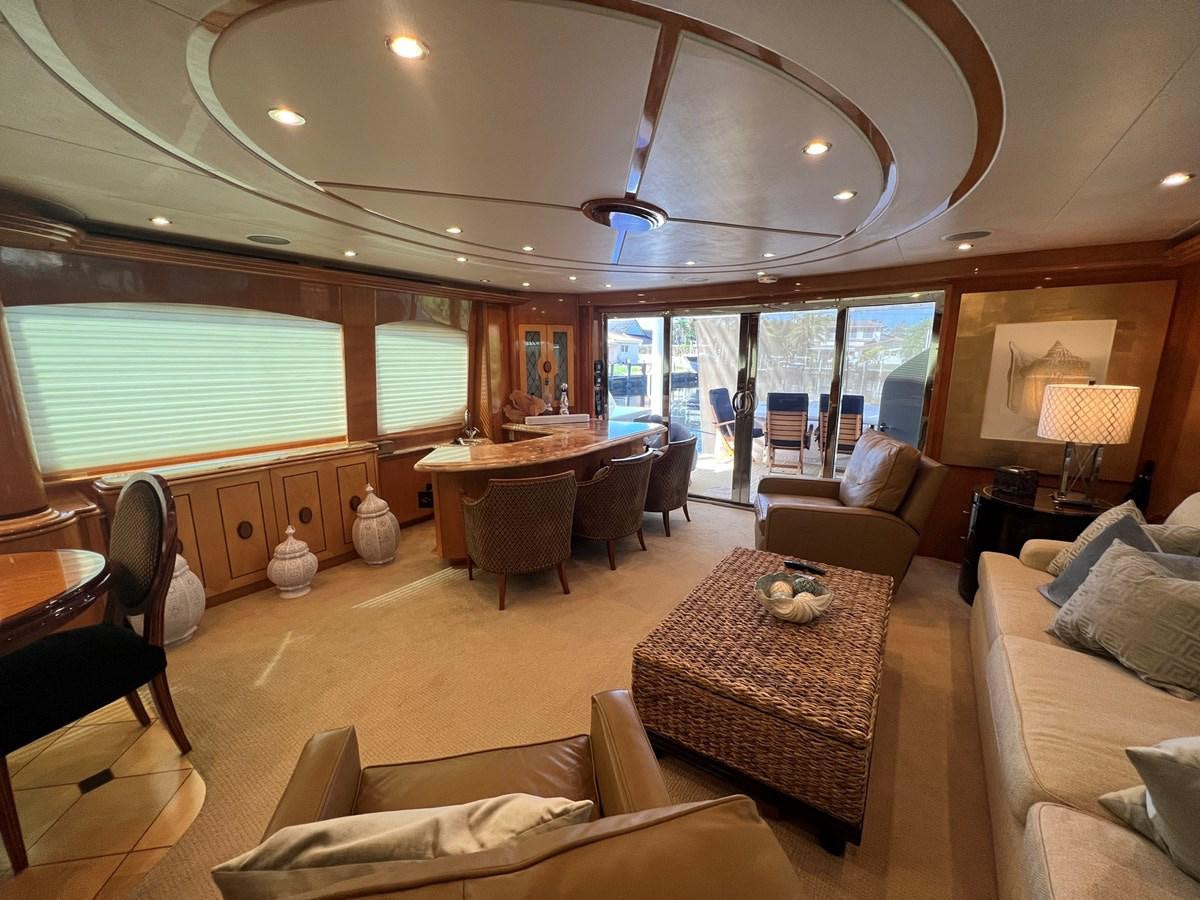 a large living room with a large window aboard ARETECTE Yacht for Sale