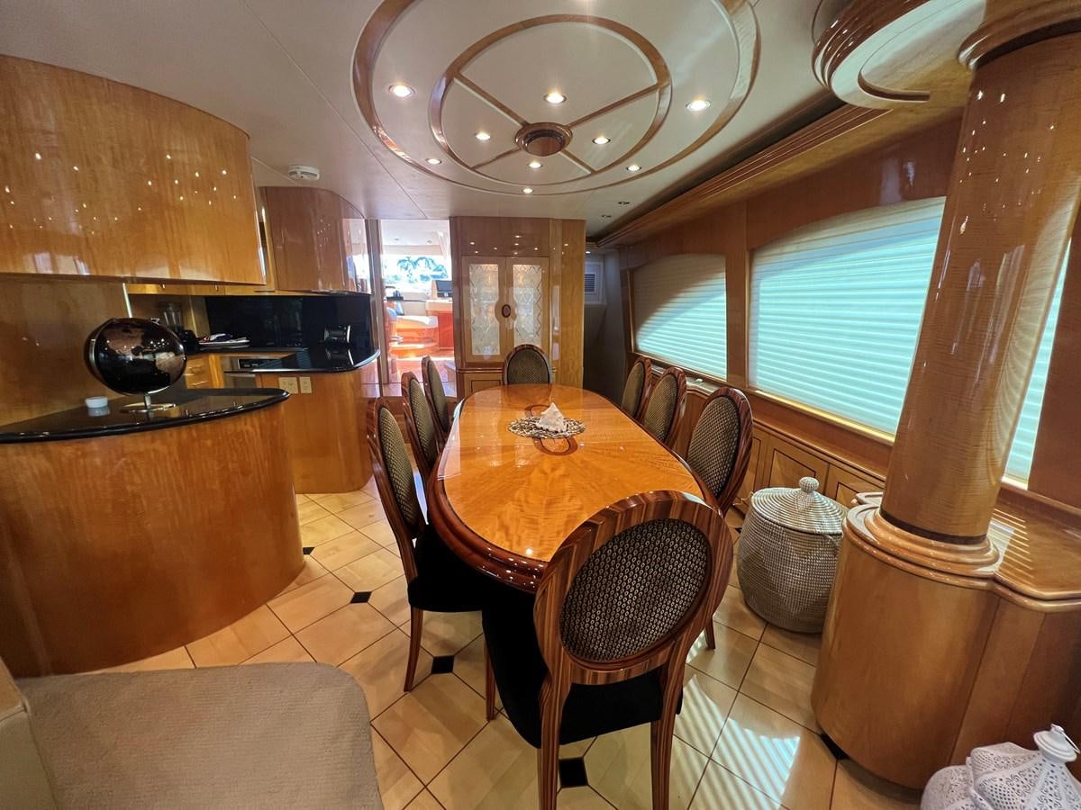a dining table in a kitchen aboard ARETECTE Yacht for Sale