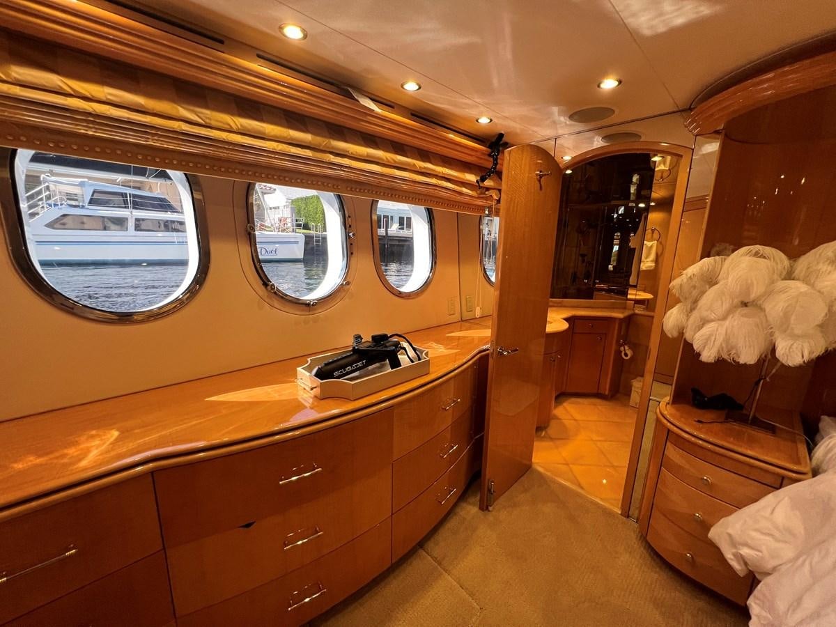 a train with a counter and a mirror aboard ARETECTE Yacht for Sale