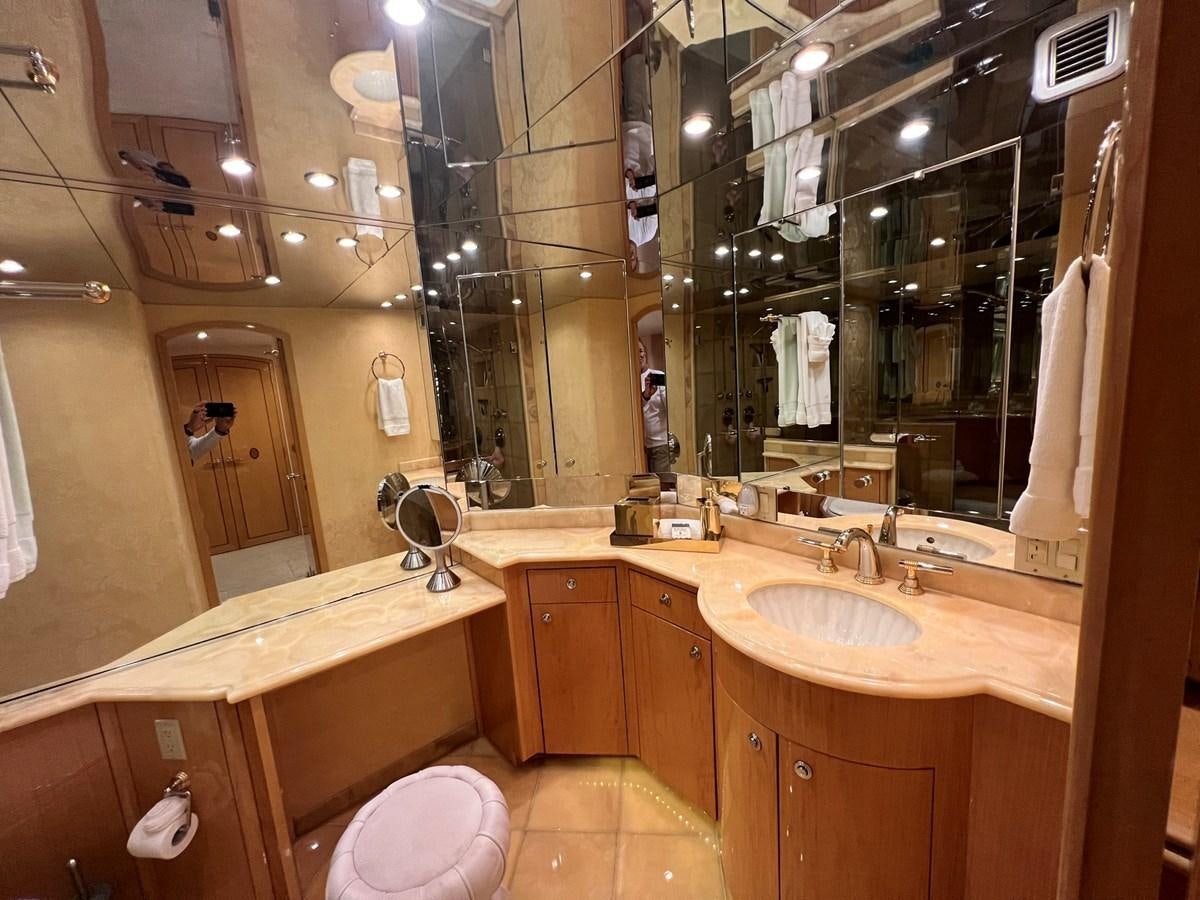 a bathroom with a large mirror aboard ARETECTE Yacht for Sale