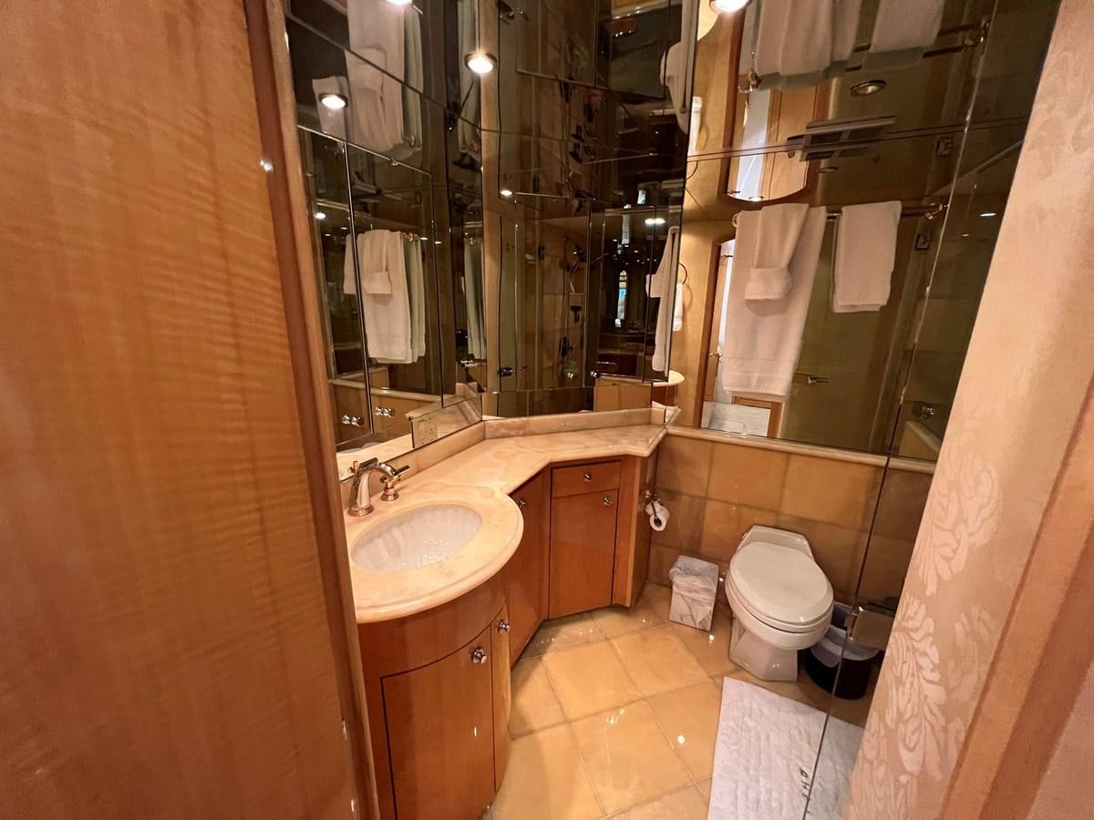 a bathroom with a sink and toilet aboard ARETECTE Yacht for Sale
