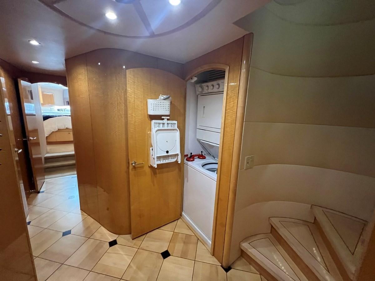 a bathroom with a sink and a mirror aboard ARETECTE Yacht for Sale
