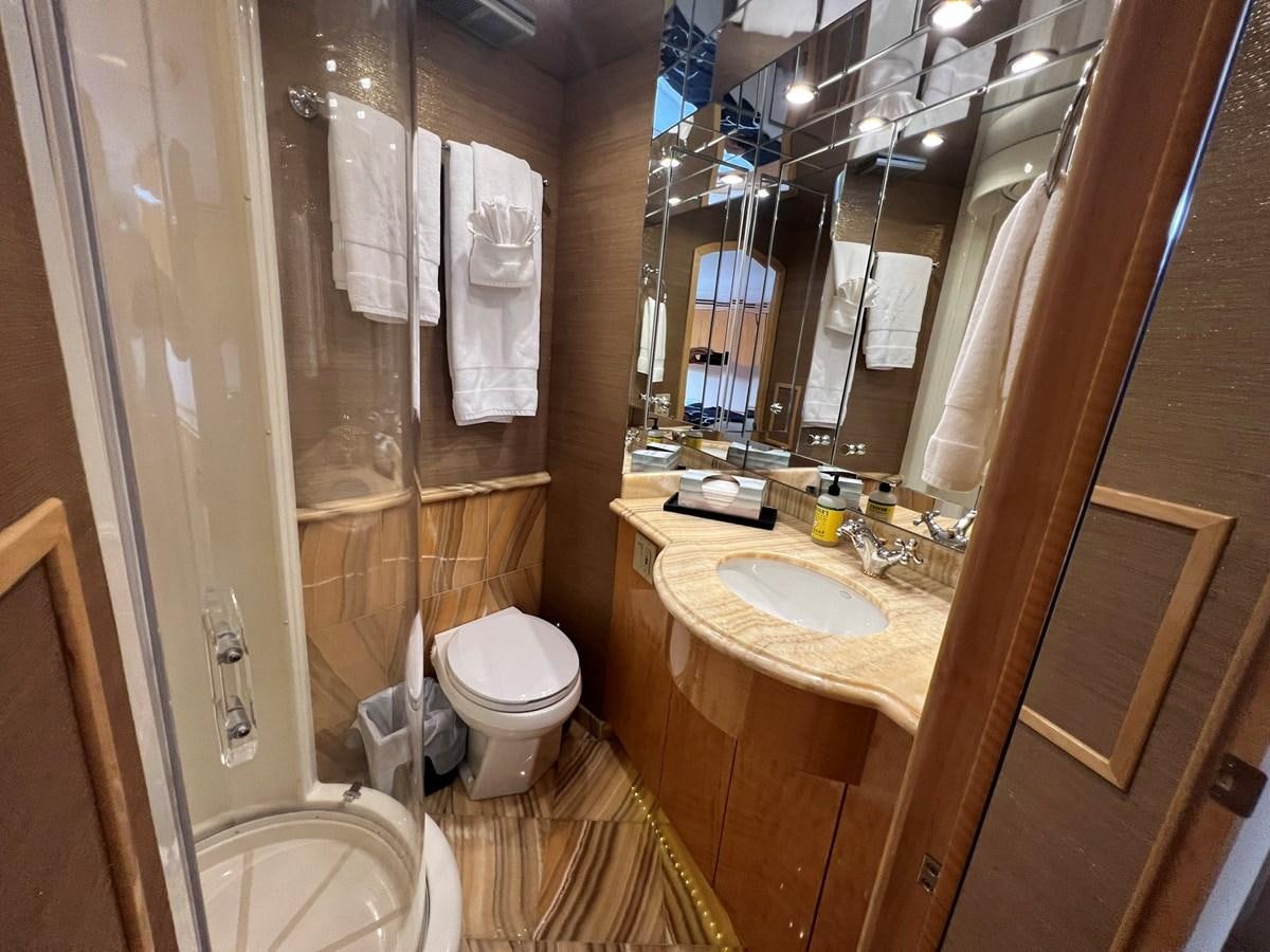 a bathroom with a sink toilet and bathtub aboard ARETECTE Yacht for Sale
