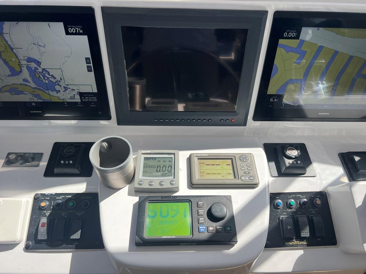 a video game console and remote control aboard ARETECTE Yacht for Sale