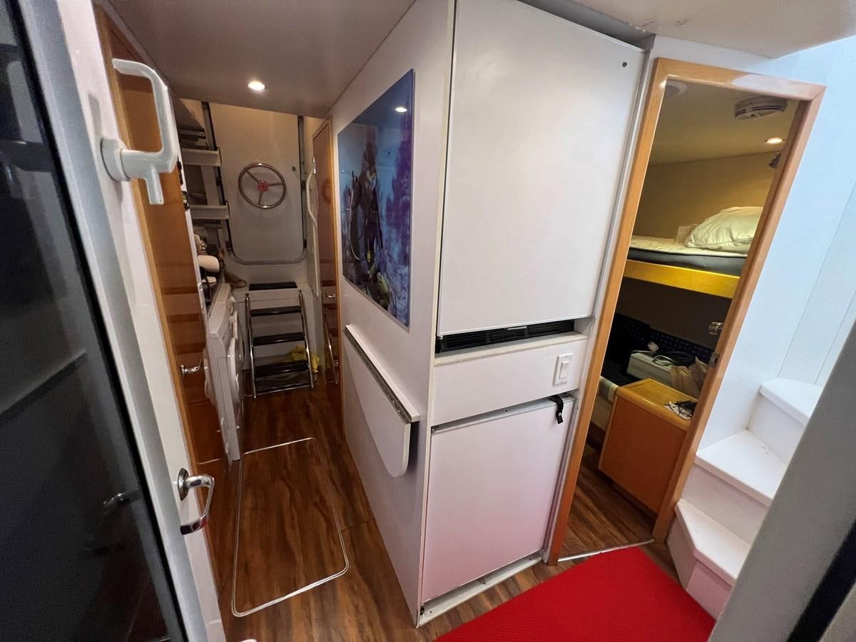 a large refrigerator in a kitchen aboard ARETECTE Yacht for Sale