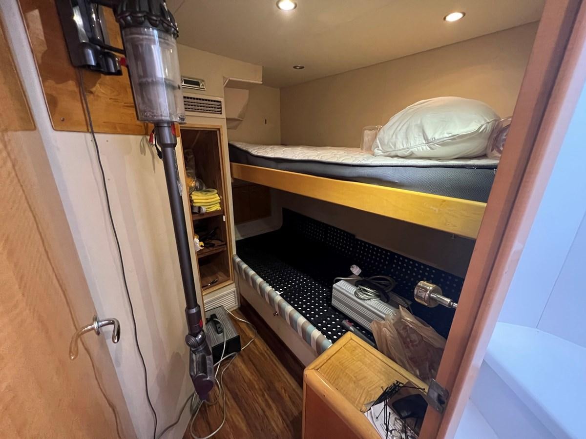 a room with a sink and a shelf with objects on it aboard ARETECTE Yacht for Sale