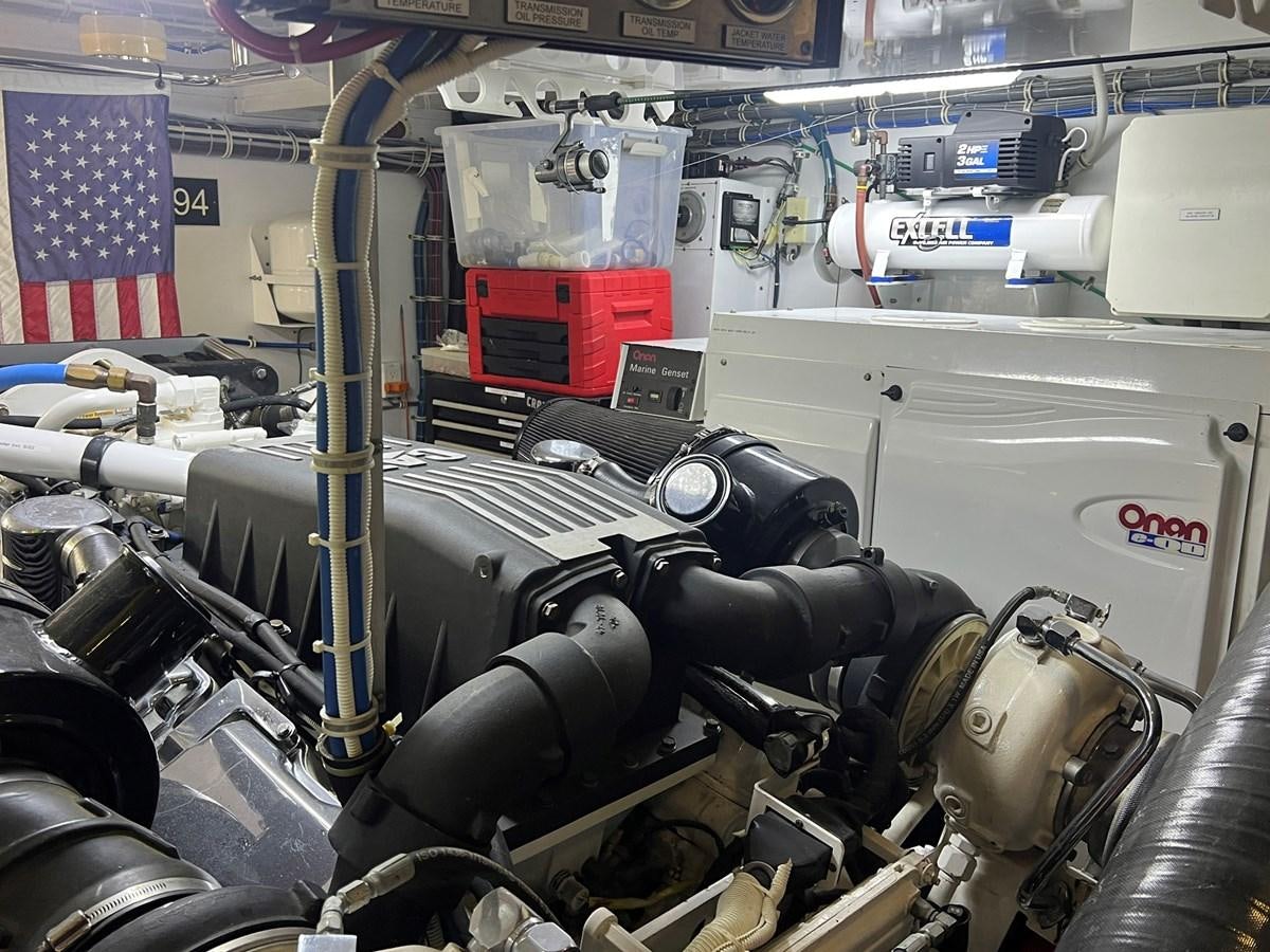 a car engine in a garage aboard ARETECTE Yacht for Sale