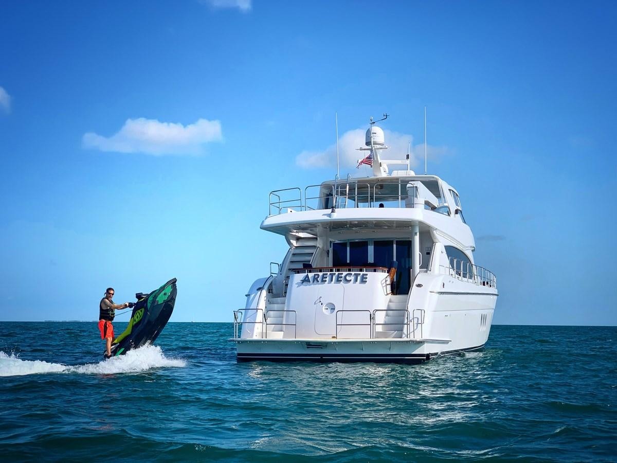 a boat with a person standing on the front aboard ARETECTE Yacht for Sale