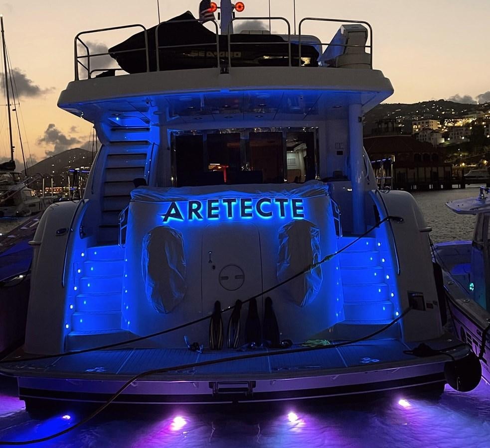 a large blue and white boat aboard ARETECTE Yacht for Sale