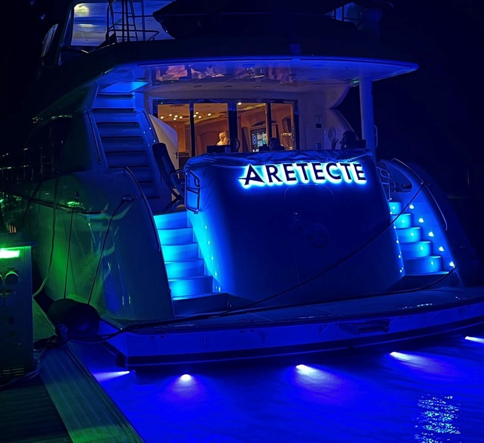 a large blue and white sign on a stage aboard ARETECTE Yacht for Sale