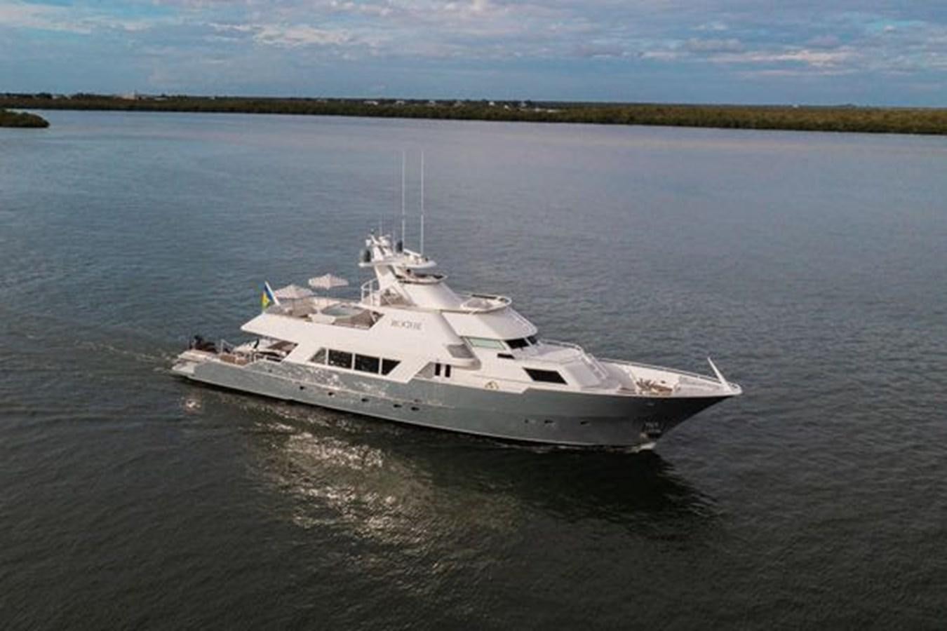 a white boat on the water aboard ROGUE Yacht for Sale