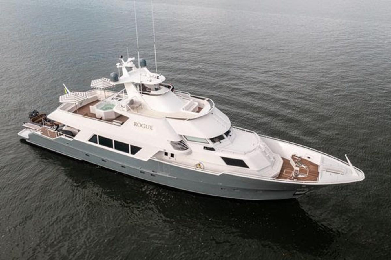 a white yacht in the water aboard ROGUE Yacht for Sale