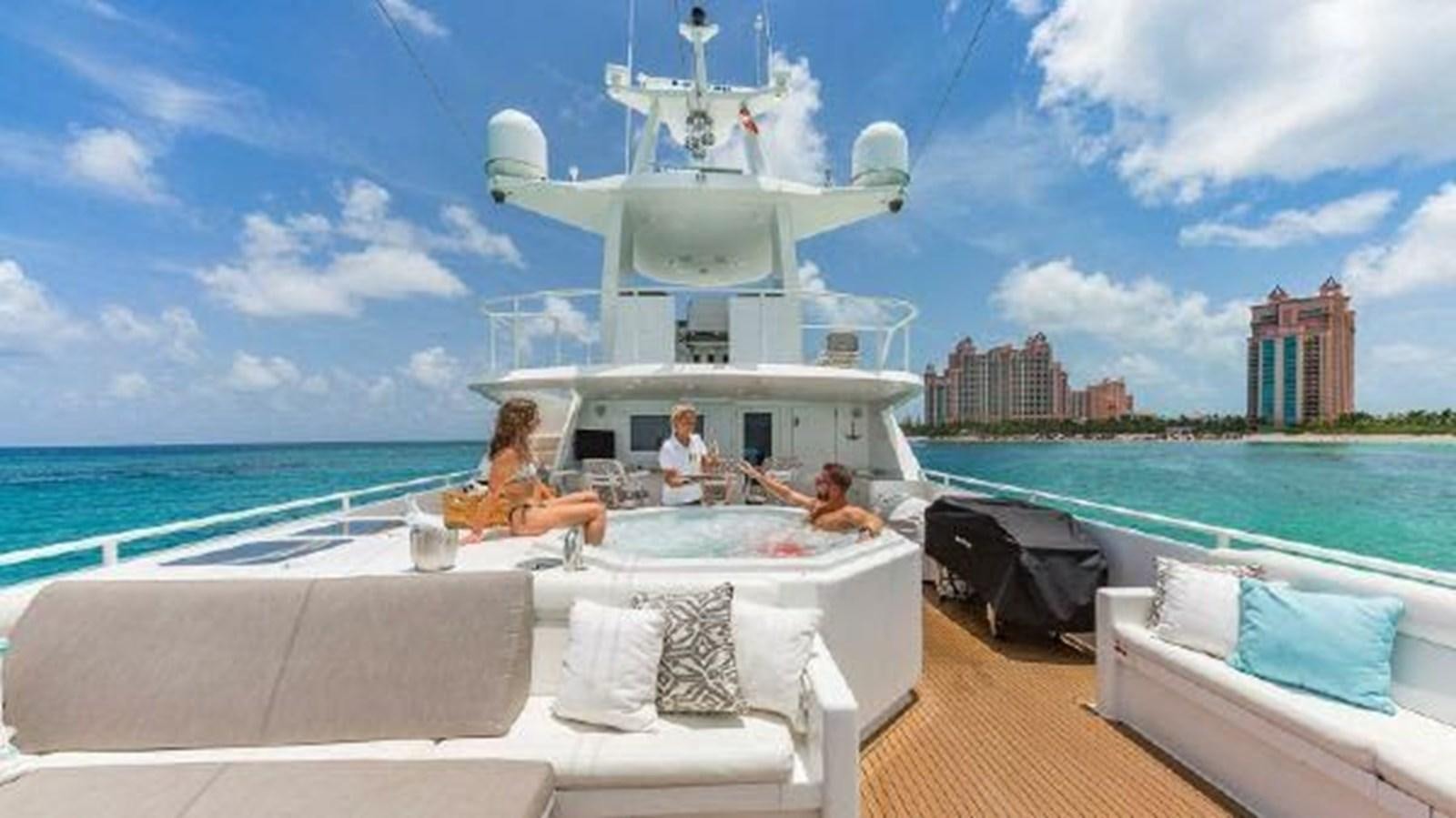 a couple of people on a boat aboard ROGUE Yacht for Sale