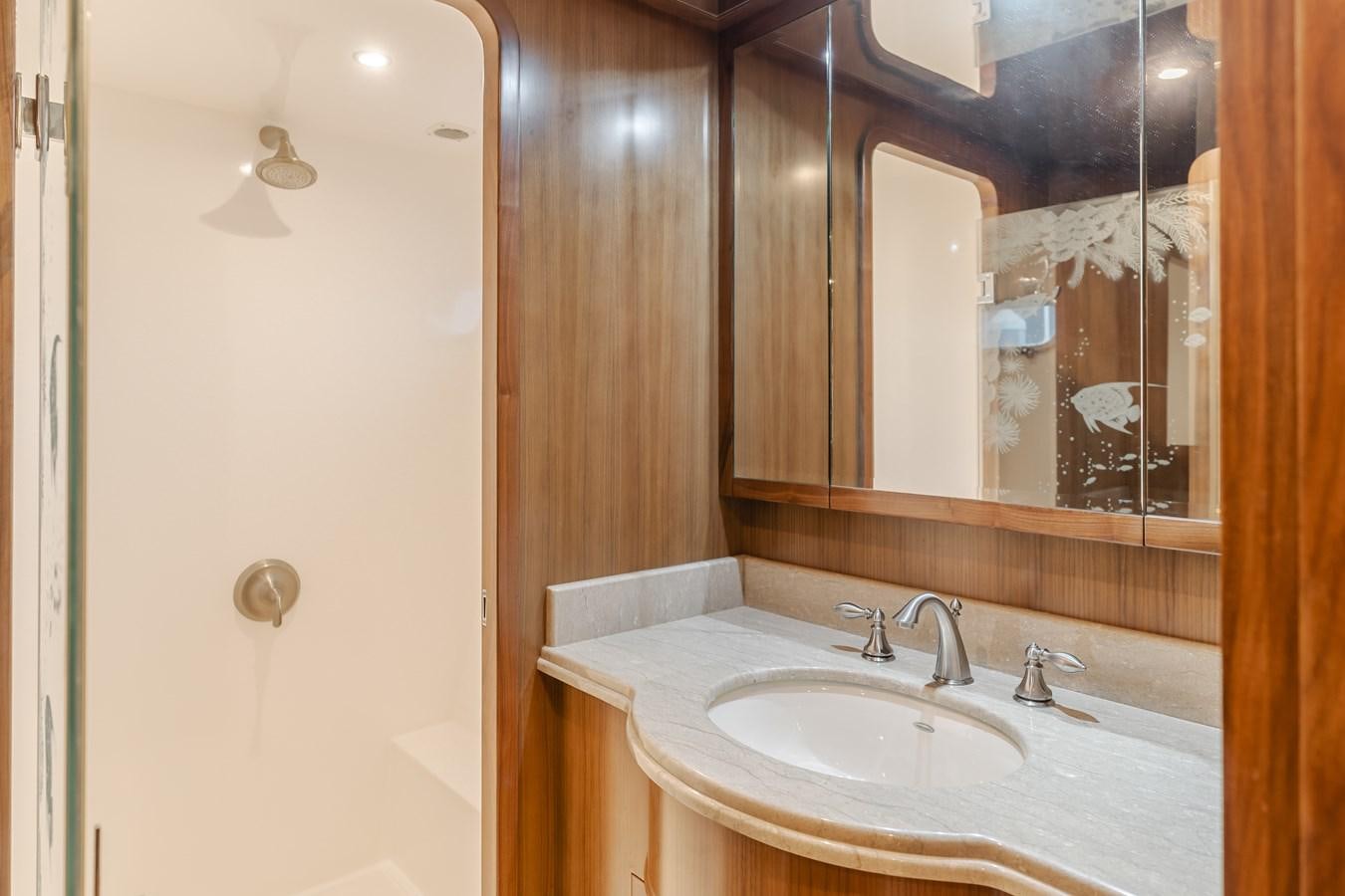 a bathroom with a sink and a mirror aboard HARLEY G Yacht for Sale