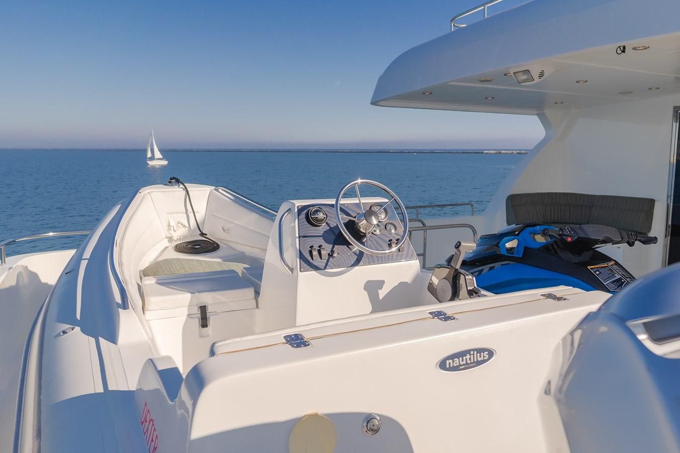 a boat with a steering wheel aboard HARLEY G Yacht for Sale