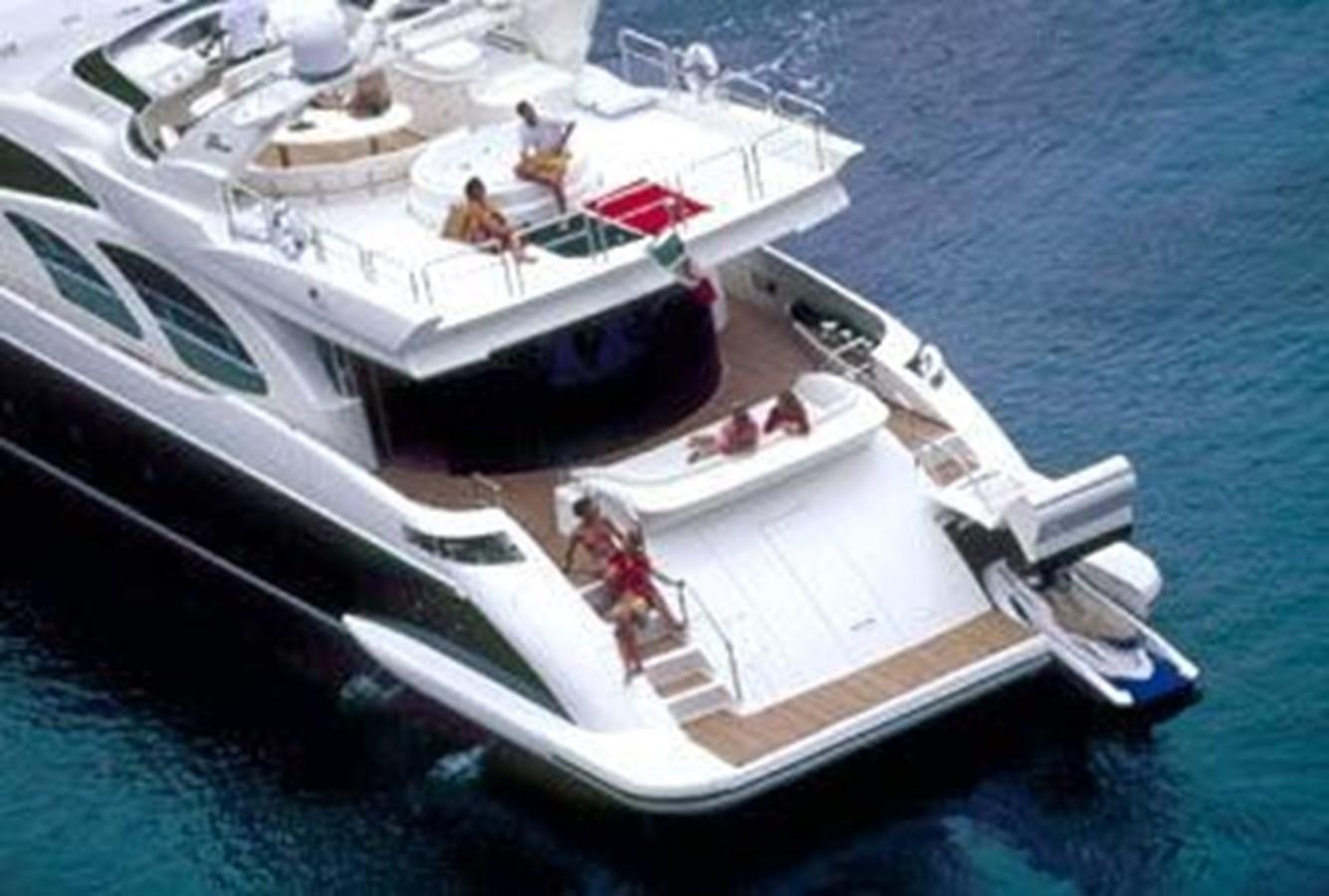 a boat with people on it aboard 2004 AZIMUT 98 LEONARDO Yacht for Sale