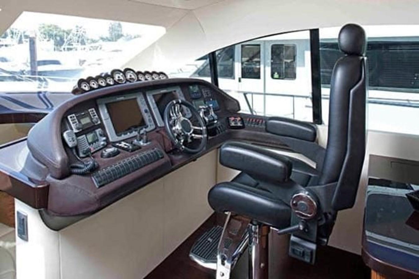 the inside of a car aboard 2010 CUSTOM AXCELL  650 POWER CATAMARAN Yacht for Sale