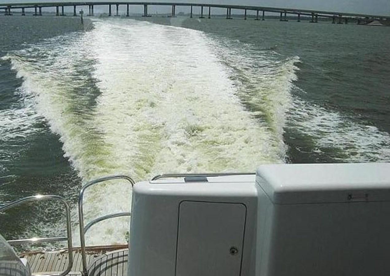 a boat on the water aboard 2010 CUSTOM AXCELL  650 POWER CATAMARAN Yacht for Sale