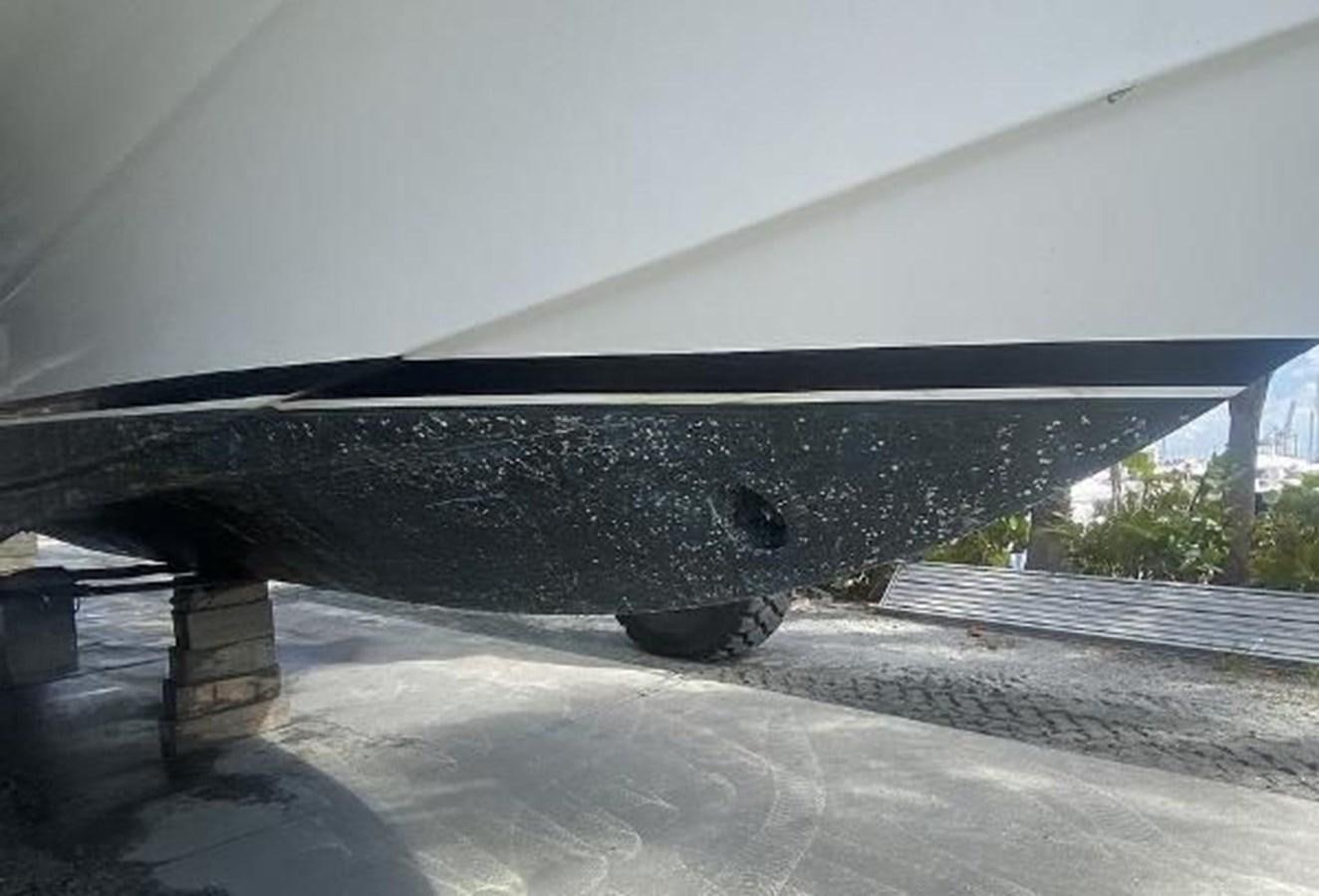 a close up of a car aboard 2010 CUSTOM AXCELL  650 POWER CATAMARAN Yacht for Sale