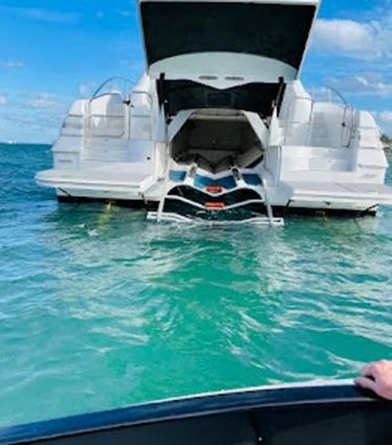 a boat in the water aboard 2010 CUSTOM AXCELL  650 POWER CATAMARAN Yacht for Sale