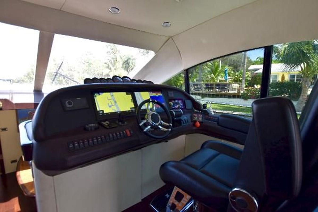 the inside of a car aboard 2010 CUSTOM AXCELL  650 POWER CATAMARAN Yacht for Sale