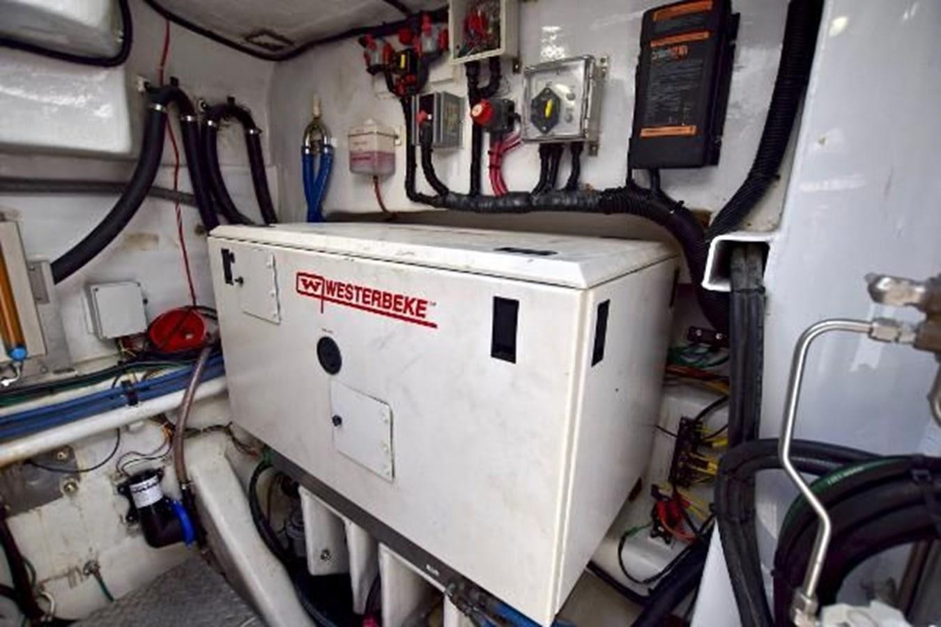 a machine with a white panel aboard 2010 CUSTOM AXCELL  650 POWER CATAMARAN Yacht for Sale