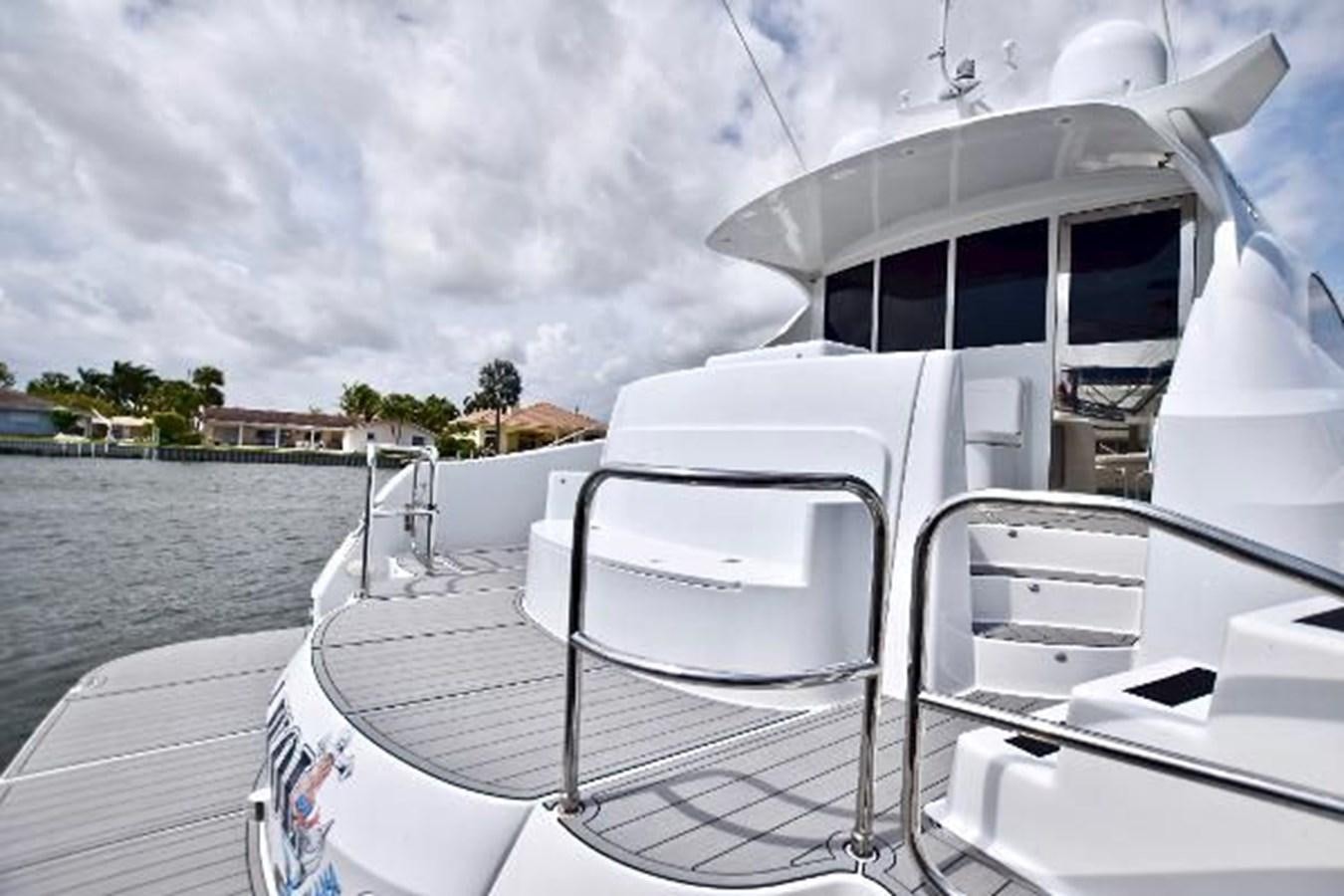 a boat on the water aboard 2010 CUSTOM AXCELL  650 POWER CATAMARAN Yacht for Sale