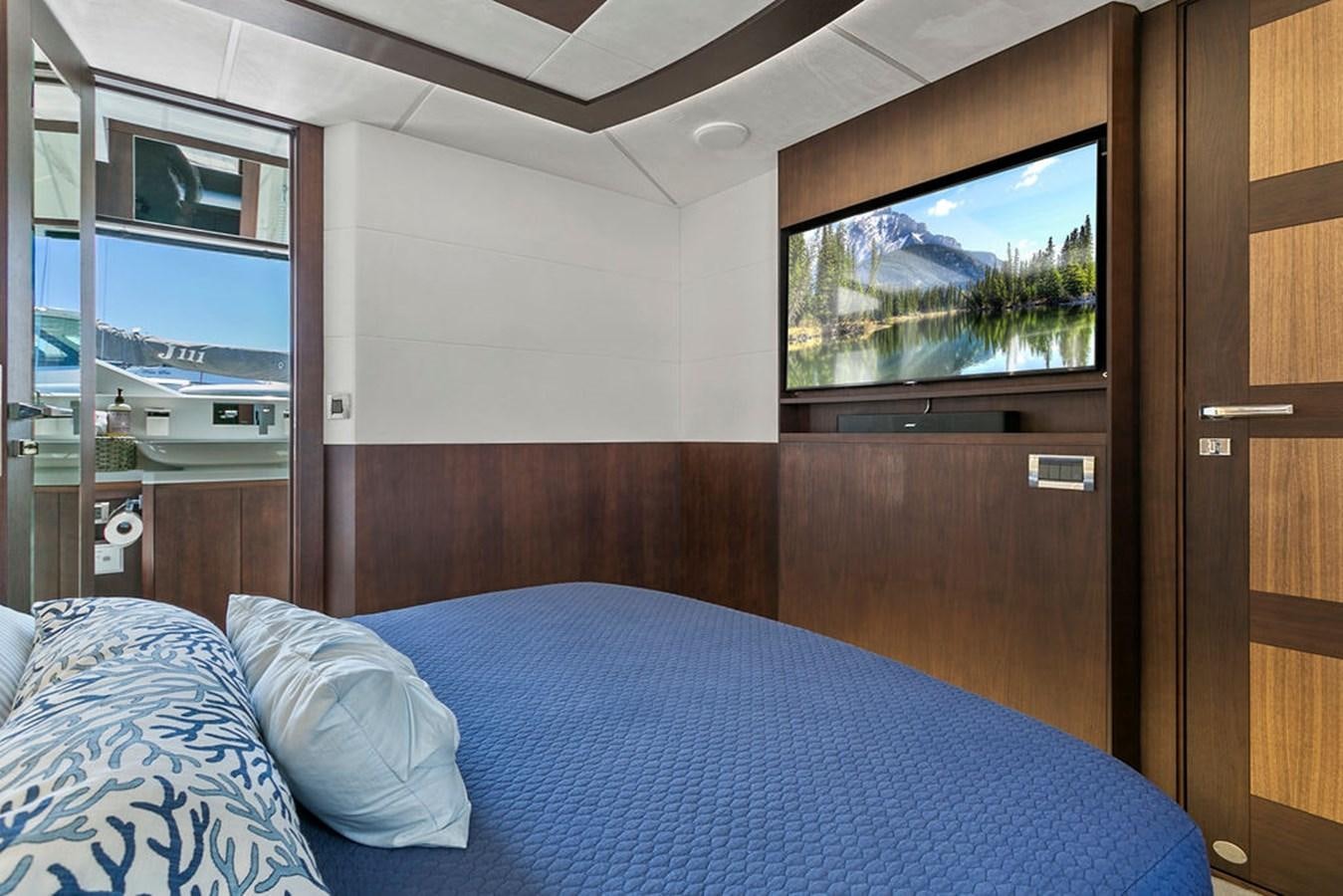 a bed in a room aboard NOKOKO Yacht for Sale