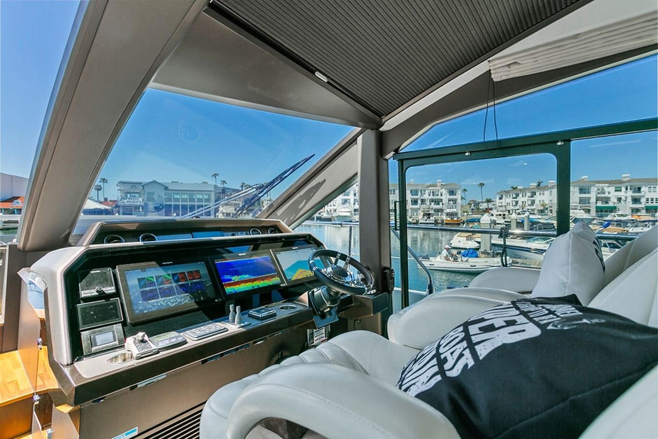 inside of a vehicle with a view of the city aboard NOKOKO Yacht for Sale