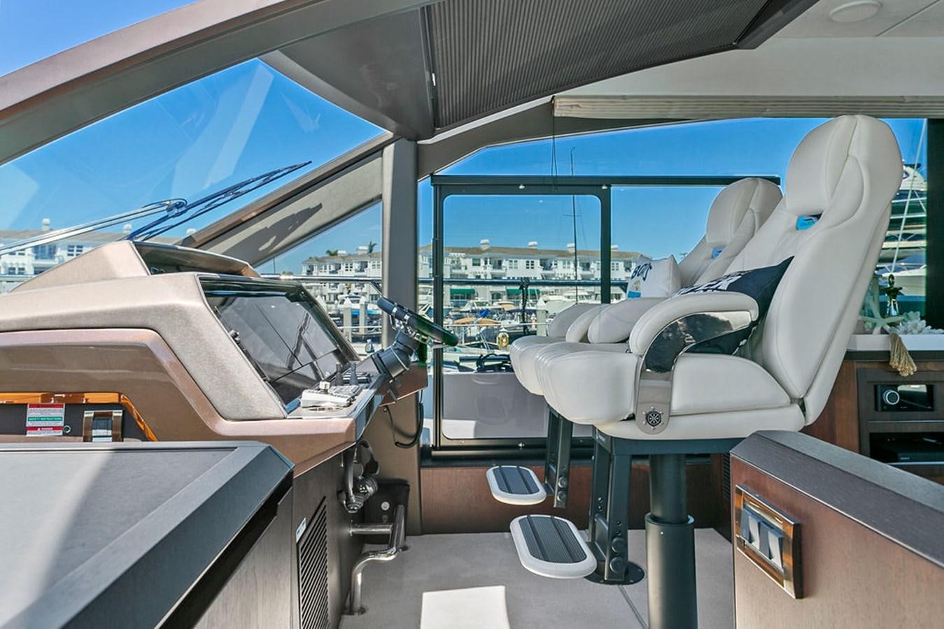 a vehicle with a desk and a chair aboard NOKOKO Yacht for Sale
