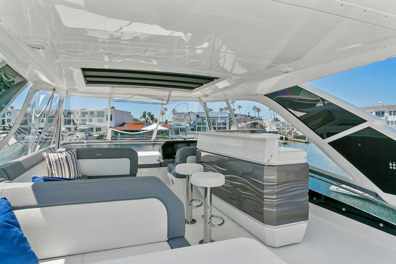 inside of a white tent aboard NOKOKO Yacht for Sale