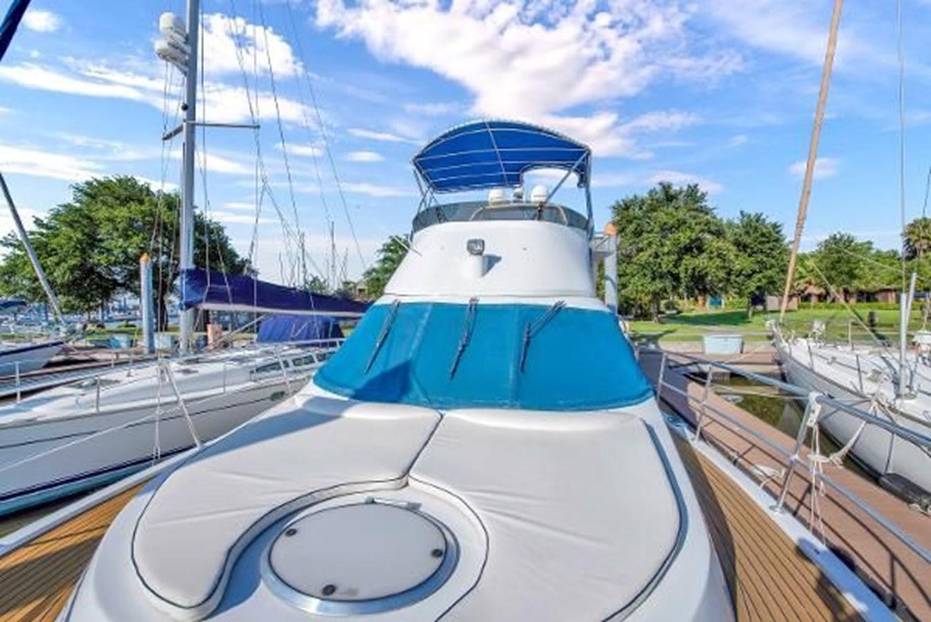 a boat in a harbor aboard DREAM CATCHER Yacht for Sale