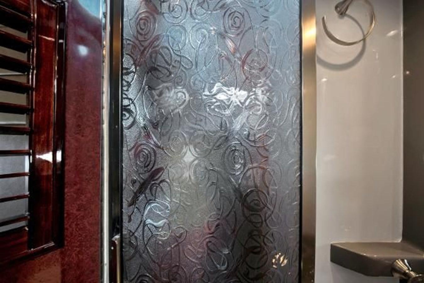 a wall with a painting on it aboard DREAM CATCHER Yacht for Sale