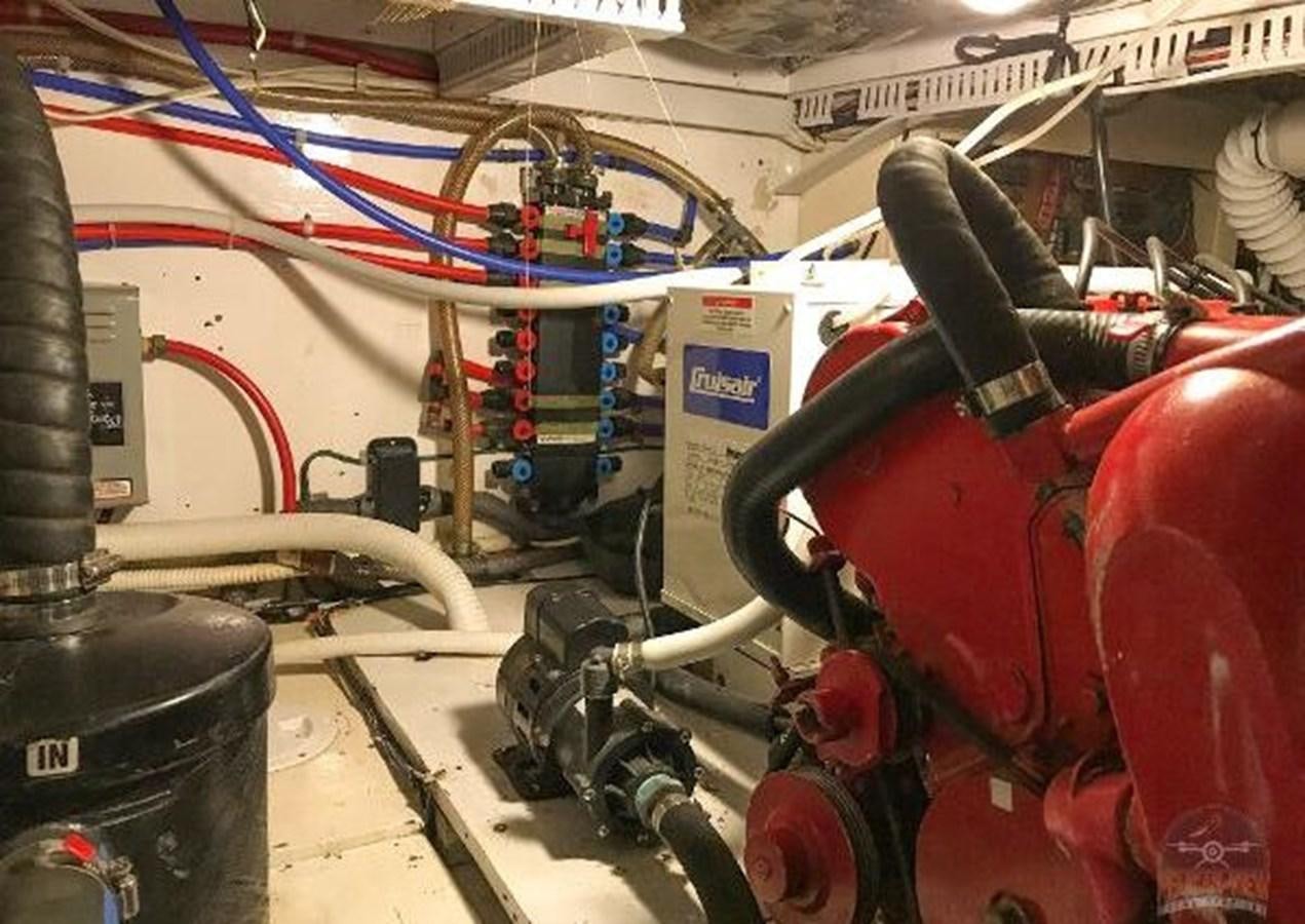 a machine with a large metal pipe aboard DREAM CATCHER Yacht for Sale