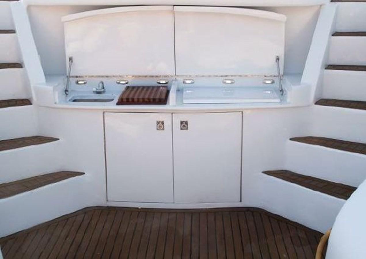 a white cabinet with drawers aboard DREAM CATCHER Yacht for Sale
