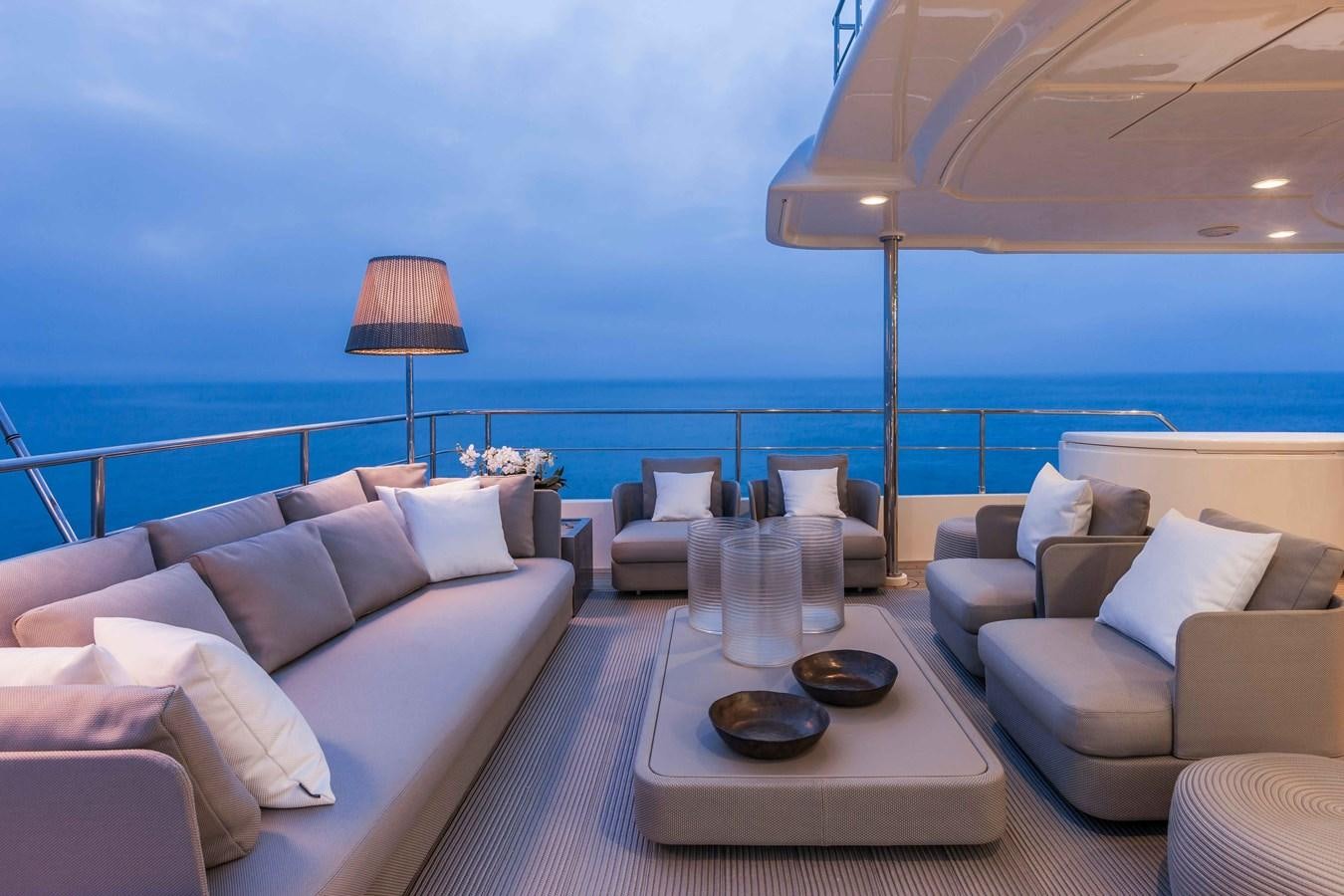 a living room with a large ocean aboard YVONNE Yacht for Sale