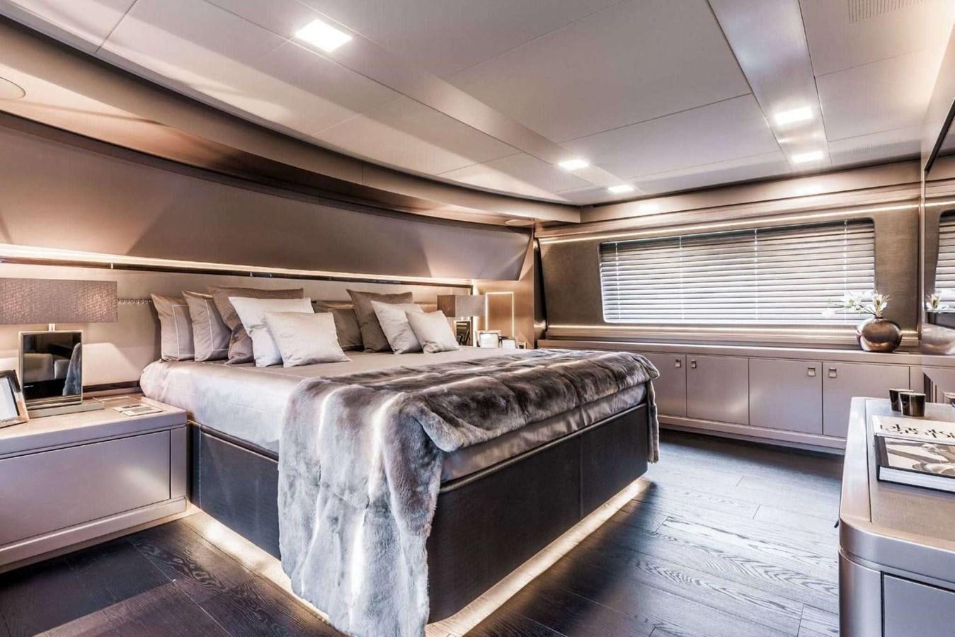 a large bed in a room aboard YVONNE Yacht for Sale