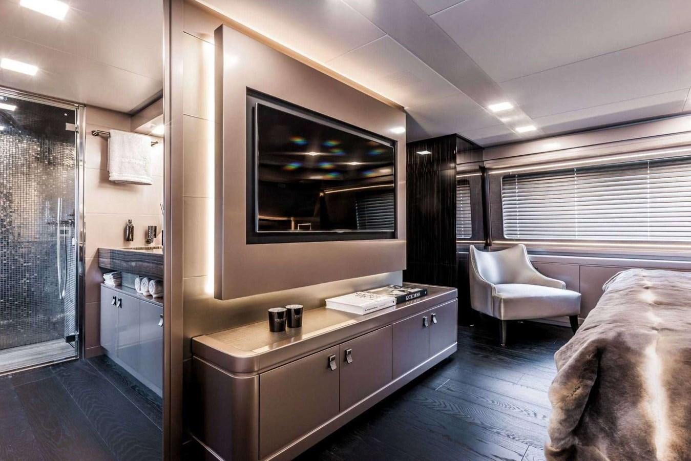 a room with a large mirror and a couch aboard YVONNE Yacht for Sale