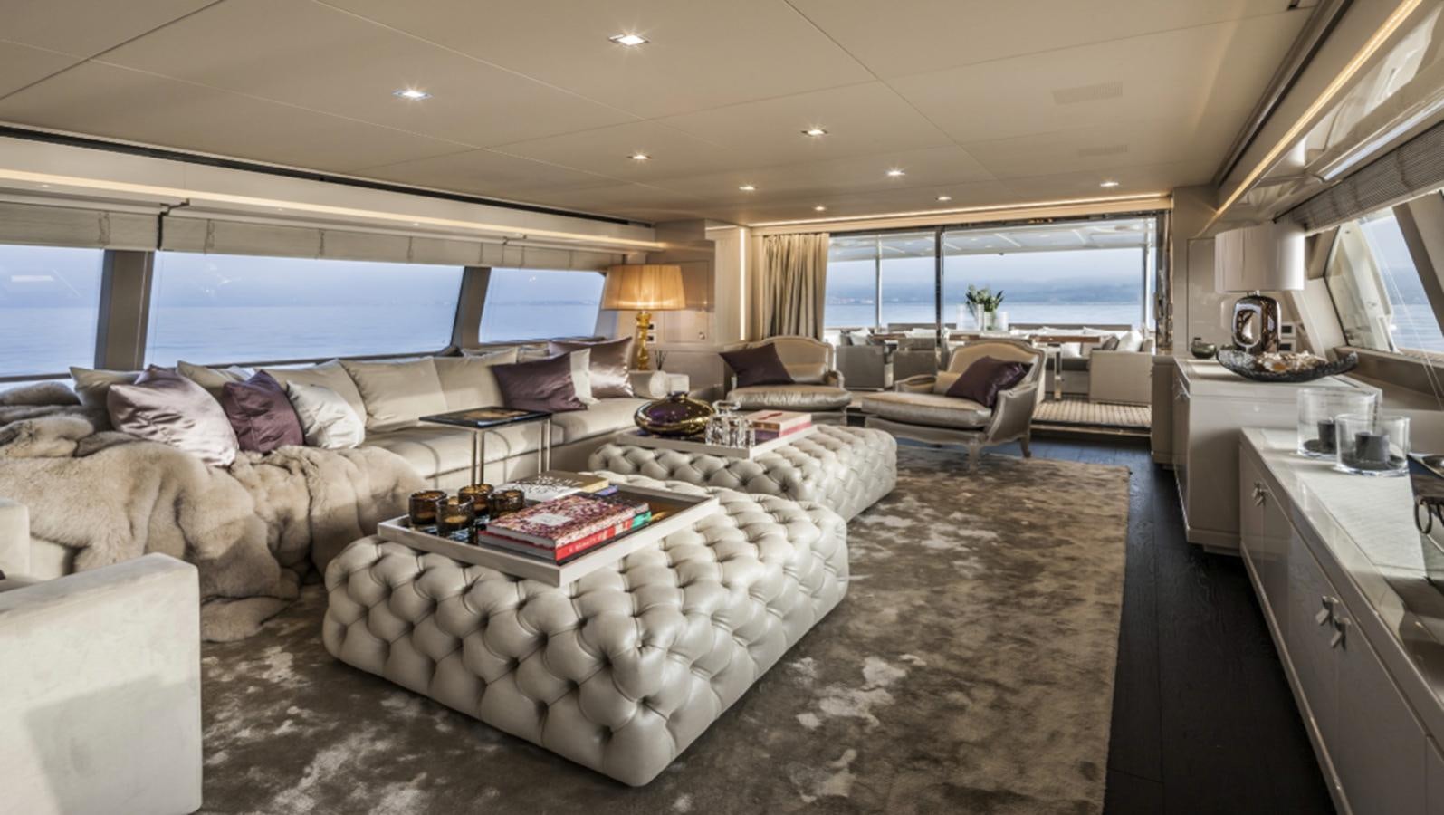 a living room with a large window aboard YVONNE Yacht for Sale