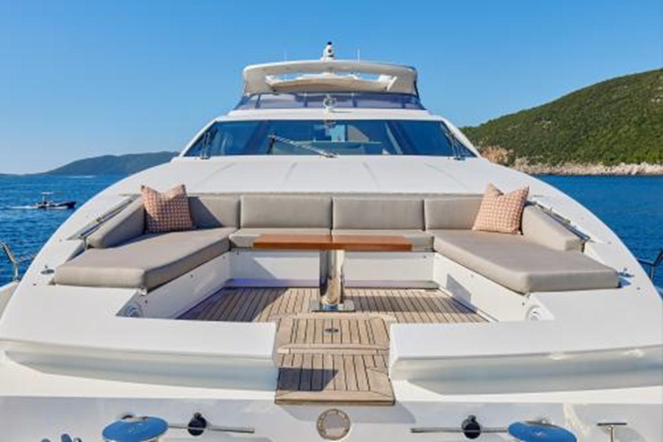 a white boat on a body of water aboard SILVIA Yacht for Sale
