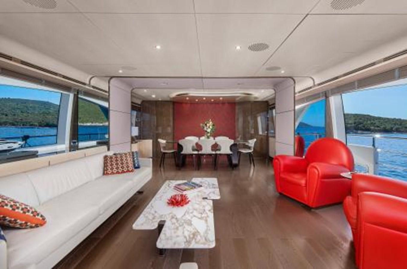 a living room with a large window aboard SILVIA Yacht for Sale