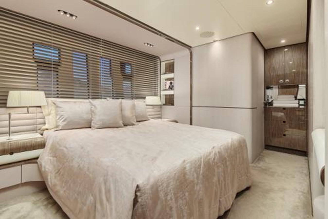 a large bedroom with a large bed aboard SILVIA Yacht for Sale