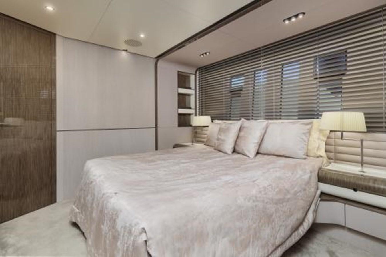 a bed in a room aboard SILVIA Yacht for Sale