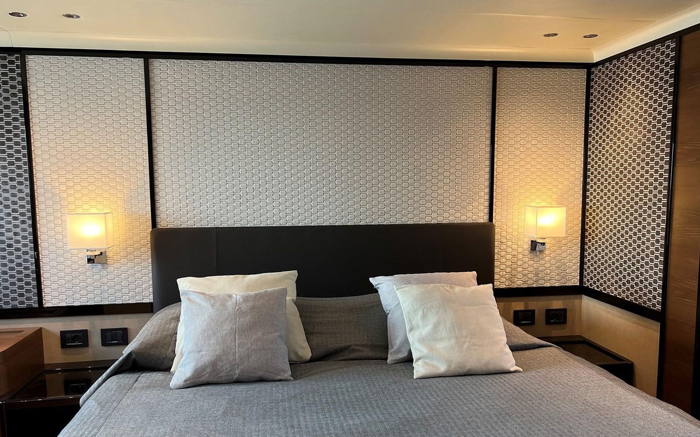 a bed with pillows aboard A4A Yacht for Sale