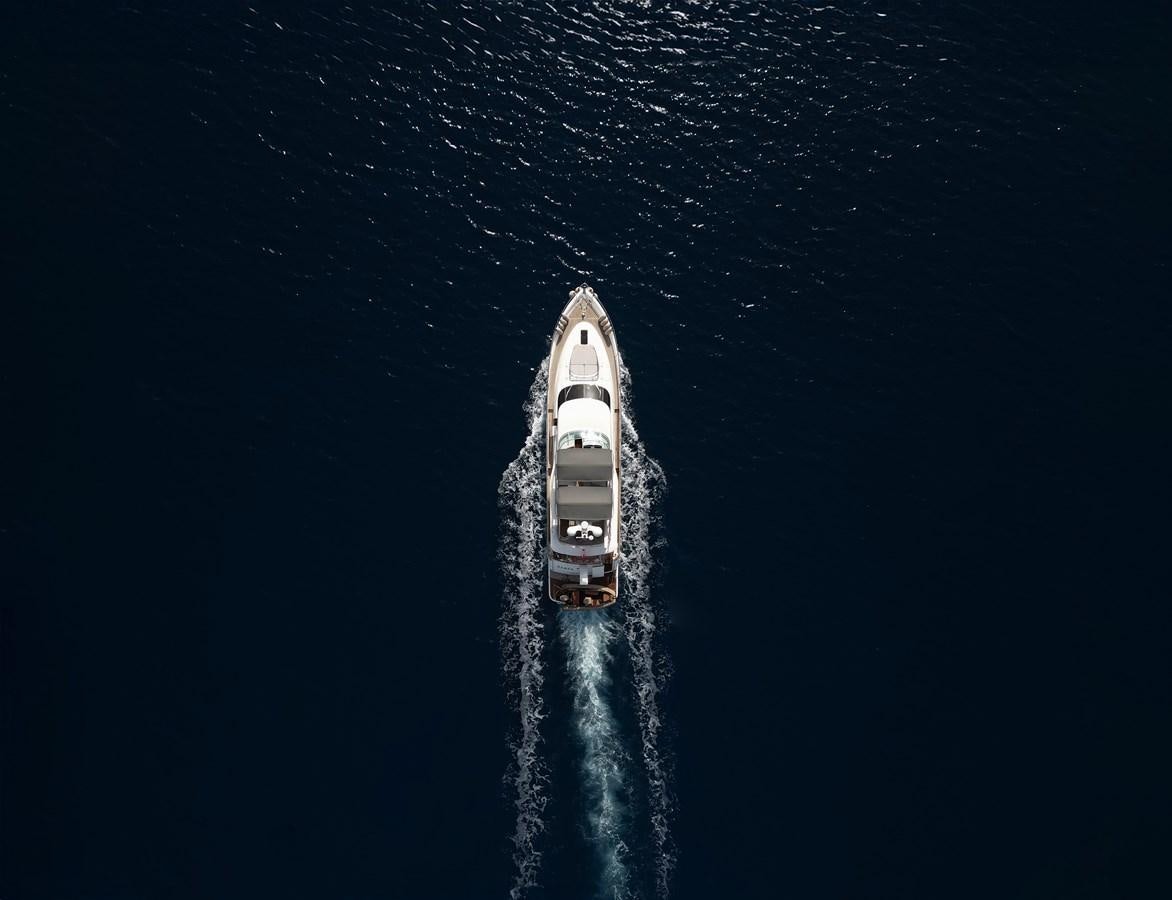 a rocket with smoke coming out of it with Chrysler Building in the background aboard FAIRLINE SQUADRON 74 Yacht for Sale