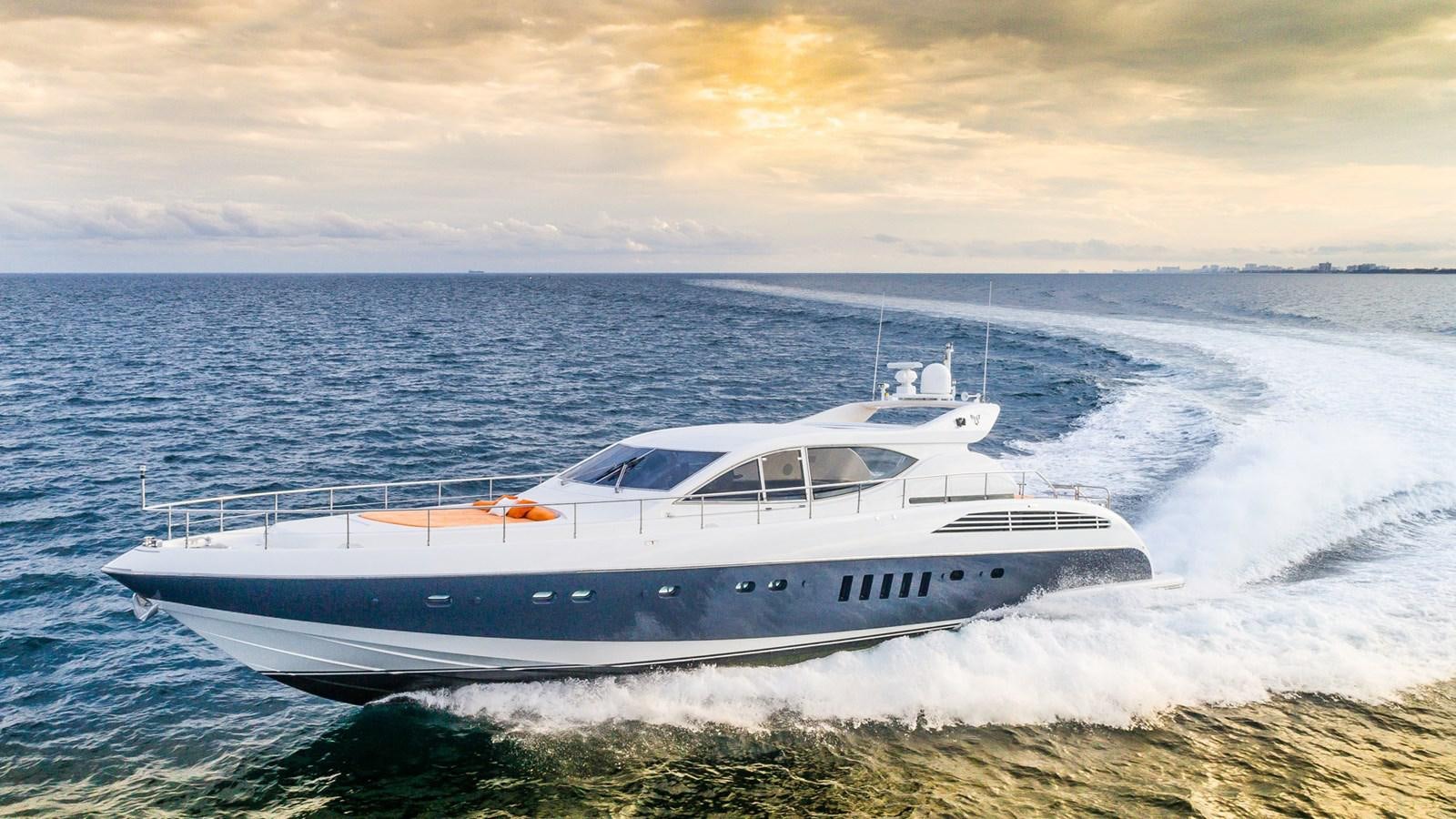 a white boat on the water aboard DOLCE VITA II Yacht for Sale
