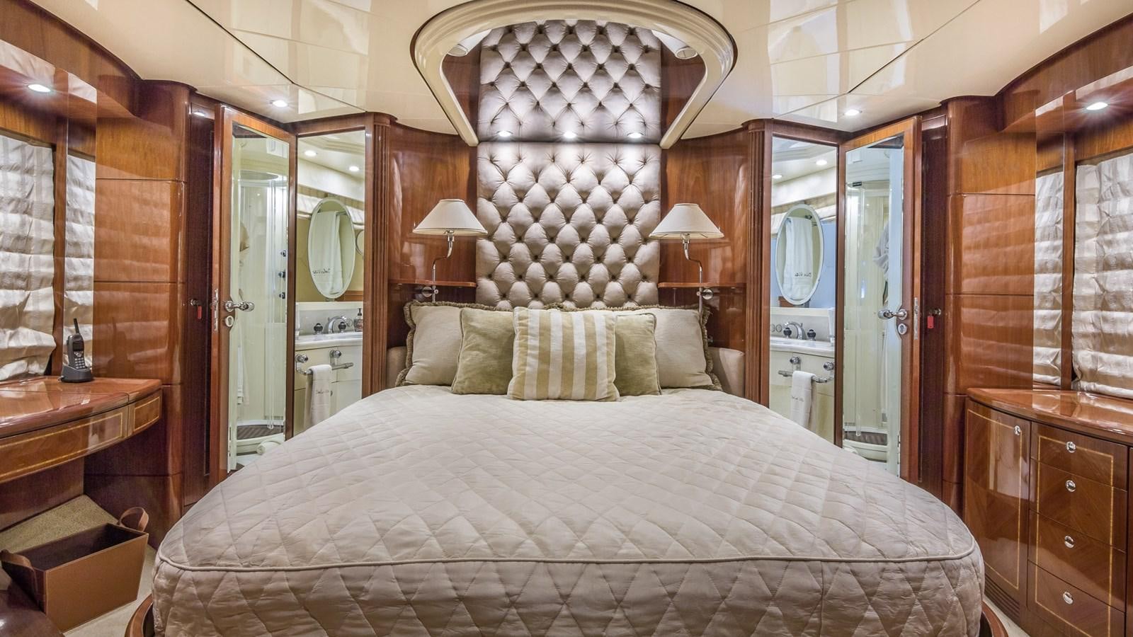 a large bed in a room aboard DOLCE VITA II Yacht for Sale