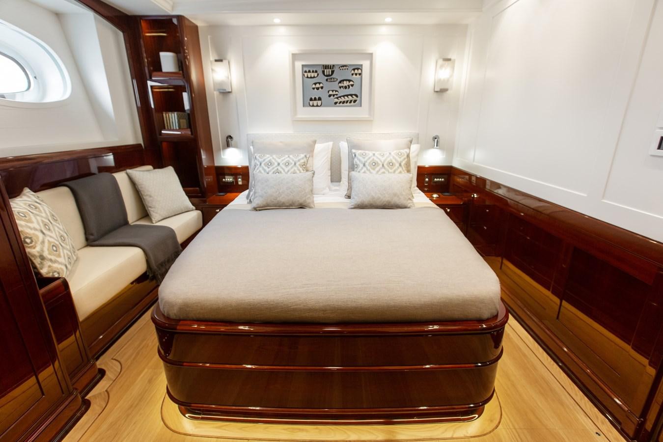 a bed in a room aboard GRACE III Yacht for Sale